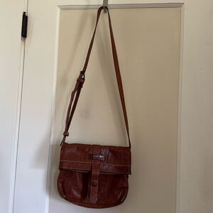 The Frye Company small messenger style purse